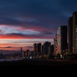 View of the skyline at sunset in winter from the promenade beach of Benidorm on the Costa Blanca, Alicante, Spain.